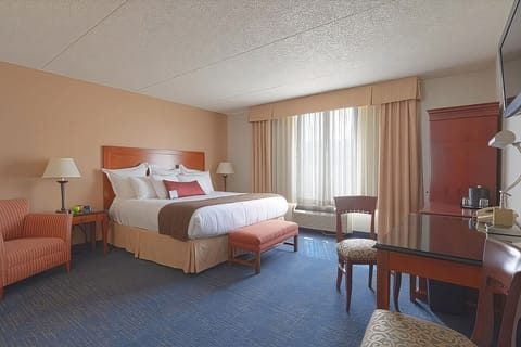 Settle into a crisp king bed for restful, quiet nights.
