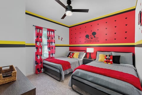 Newly updated with more Mickey!
Disney-themed 2nd floor bedroom with 2 full beds