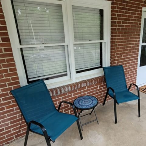 Hang and relax on the front porch under the fan.