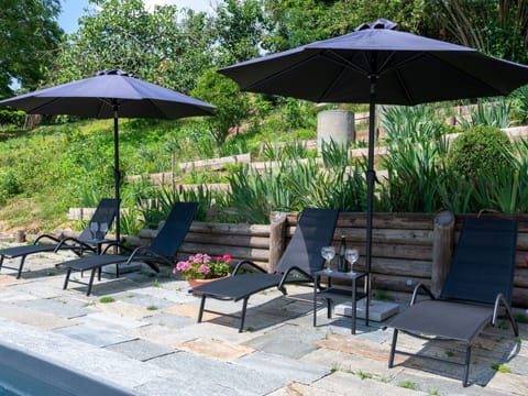 Table, Sky, Furniture, Tableware, Building, Interior Design, Outdoor Furniture, Porch, Shade, Chair