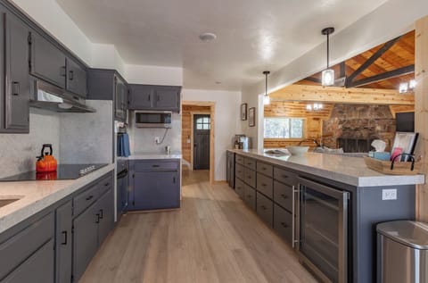 Open-concept kitchen with views of the dining and living room 