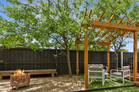 Gorgeous outdoor area with seating, BBQ and firepit
