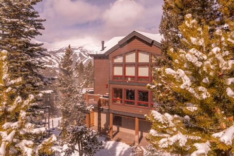 House exterior with ski area in the background