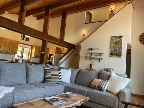 Large new sectional in spacious living area with vaulted ceilings