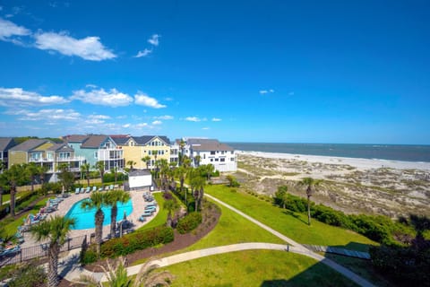 Beautiful views of the pool, dunes, and ocean from the deck