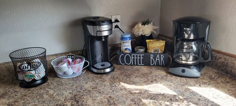 Drip and k-cup coffee machines (coffee, tea and creamer provided)