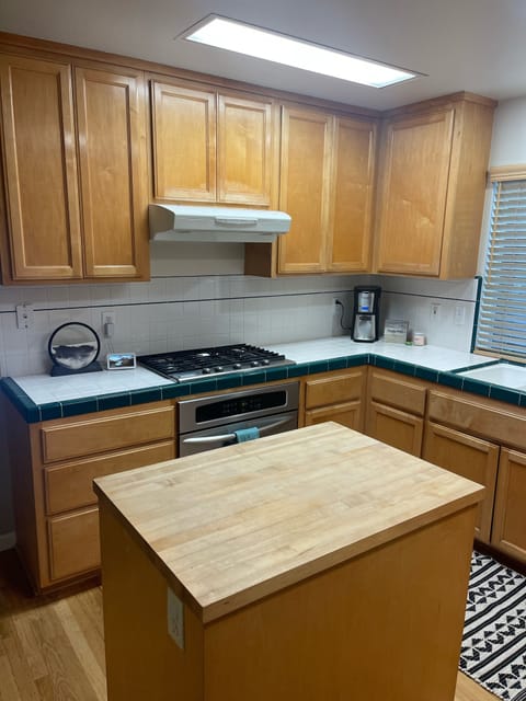 Includes pots, pans, coffee maker, cooking and baking supplies etc