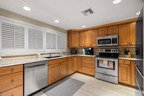 Fully Equipped Kitchen with Stainless Steel Appliances