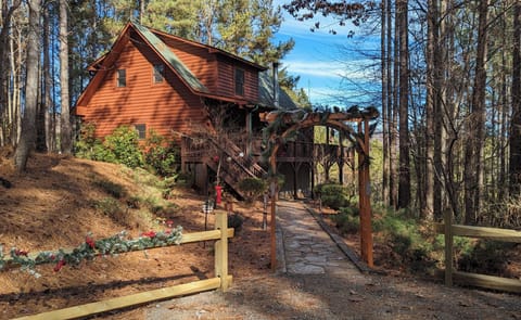 Whispering Pines Cabin is located at the top of the lane and sits on 4 acres.

