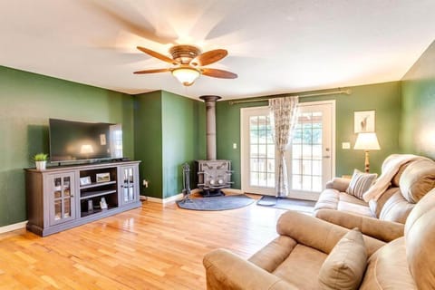 Relax on the comfy sofa and watch your favorite show on the TV.