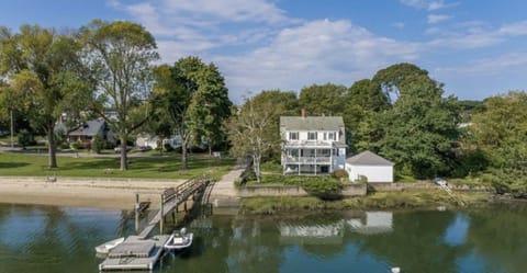 Private beach & gardens on n side of property.