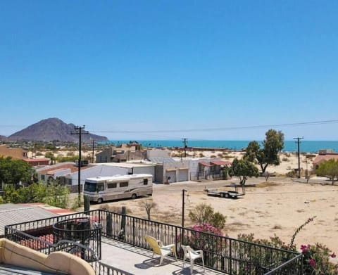 Relax on the terrace with panoramic Sea of Cortez views at this San Felipe Baja vacation rental.