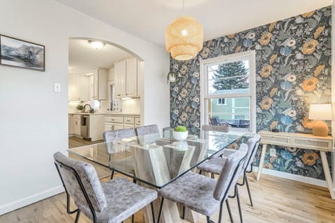 Elegant Dining Awaits: Our Table Boasts Ample Seating, Beautiful Lighting, and Stylish Furnishings