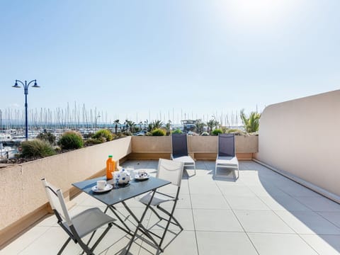 Table, Sky, Furniture, Chair, Outdoor Furniture, Building, Shade, Wood, Urban Design, Condominium
