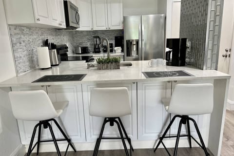 Gorgeous new updated kitchen with all new appliances and granite countertops!