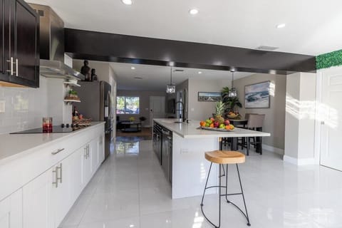 Bright, fully-stocked kitchen awaits your culinary skills. Perfect for foodies. Book now for a delicious getaway!