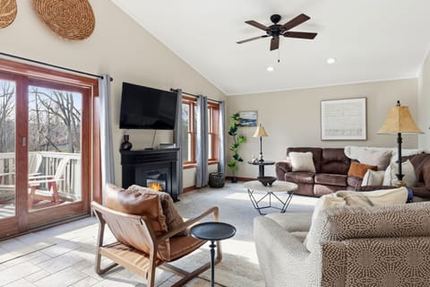 Main Floor Living Room w/ electric fireplace, newly renovated fall 2025