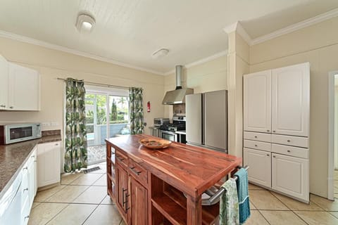 Plenty of cabinet space and room under the large island for all of your food.