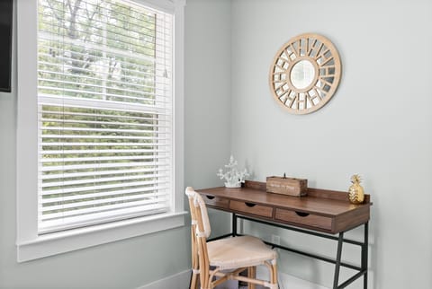 The work station desk offers drawers, spaces for pens or other items!