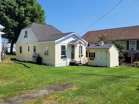 The cottage has one parking space and it's right there in front of the shed.