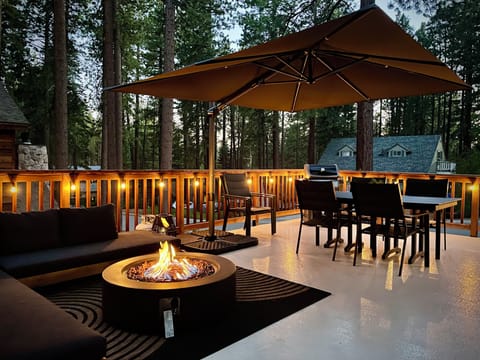 Outdoor deck furniture and the fire pit in this photo are available seasonally