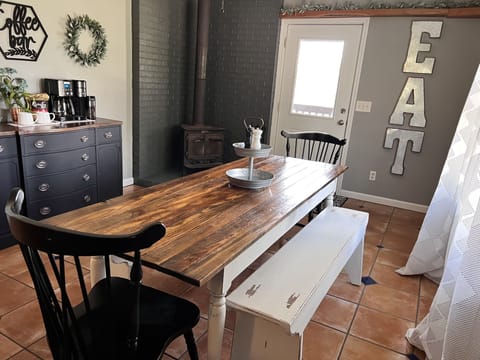 Locally made farmhouse table with seating for 8