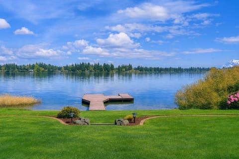 Swim, fish or boat right off the dock. Flat yard great for lawn games & relaxing