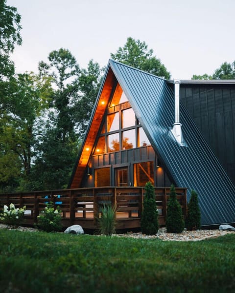 The A-Frame is beautifully illuminated at dusk.