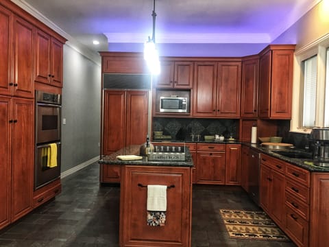 Large kitchen with double oven , all small appliances and space for prep.