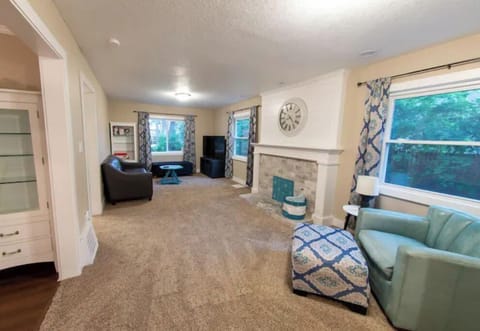 A modern family room with a 58" 4k smart TV awaits you! 