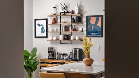 A fully loaded coffee bar includes: K cups, grounds, sugar, stevia, and creamers