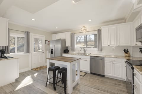 The spacious kitchen is on the lower level.