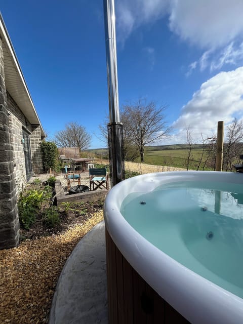 Stunning south facing views from Fern's wood fired hot tub
