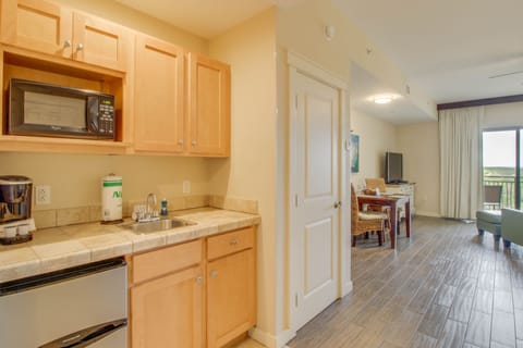 Great kitchenette with everything you'll need to make some quick meals including a microwave, single serve coffee maker, blender, toaster, and cooking utensils!