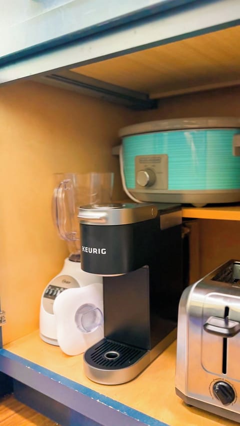 Newly renovated kitchen complete with appliances, cookware, and utensils