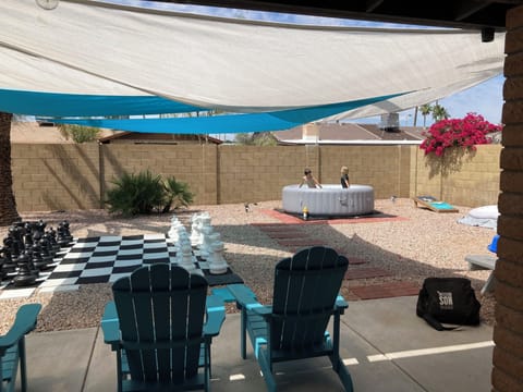 Relax and watch the kids swim, play games, or dig in the sand box. 