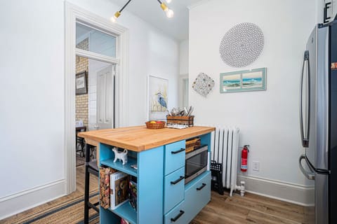 Kitchen island with microwave.