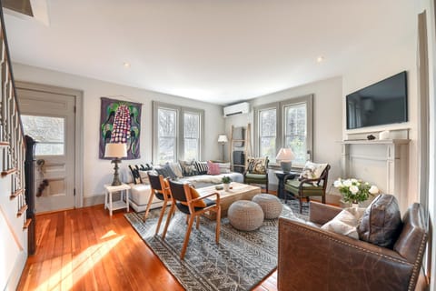 1910 farmhouse with 9 foot ceilings. Very warm living room with frame TV