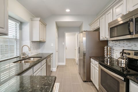 Fully stocked kitchen with full size fridge with Icemaker