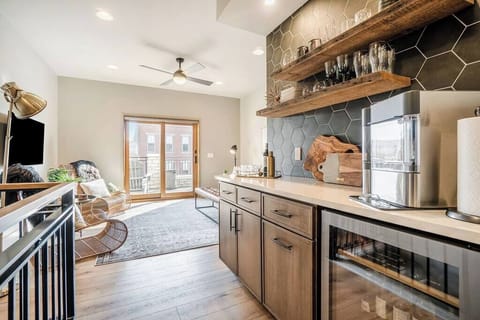 Entertain in style with this dry bar on the loft level.  All the bar ware you need with professional ice maker and beverage fridge for easy serving.