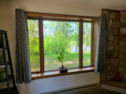 Picture window in living room with fantastic view of river!