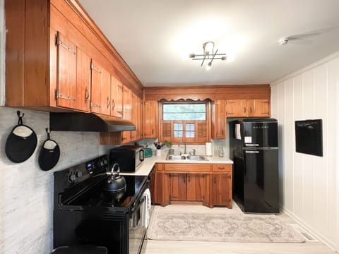 Full kitchen: Stove, dishwasher, fridge, microwave, utensils, pots, pans....