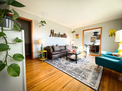 Bright and Airy Living room with huge windows. Seating for 6. Large apple
TV