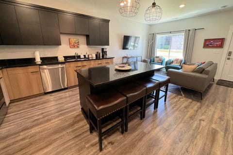 Whether you are relaxing in the living room or hanging in the kitchen, the open layout means you are always a part of the fun in this home. 