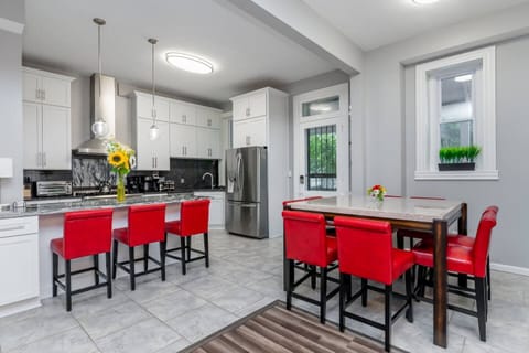 Plenty of seating at the bar and eat-in kitchen