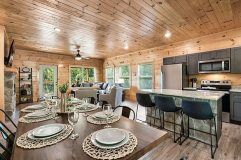 Plenty of space at the dinner table for 8, plus barstools at the island, or head to the dinner table o nthe deck. Barstools at the island also provide additional seating.