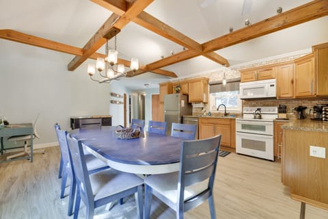 Massive kitchen space- all modern, rolling island and all you need to prep!