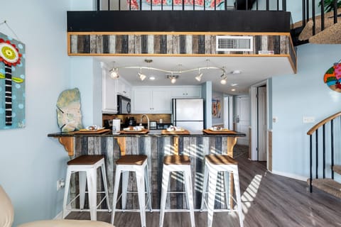 Bar and 4 Bar Stools Add Extra Dining Space