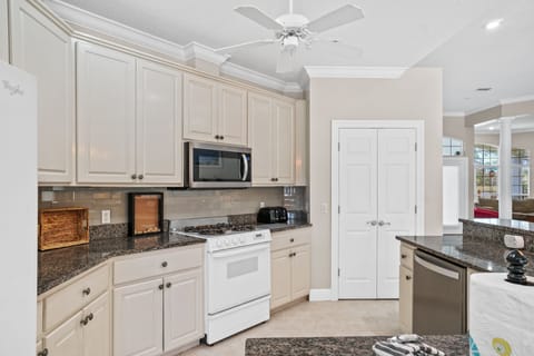 Large, open kitchen. Great for making memories and cooking family meals after a day at the beach or lounging around the pool.