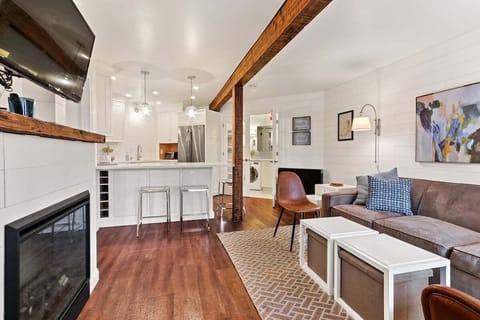 Living room with gas fireplace and smart TV